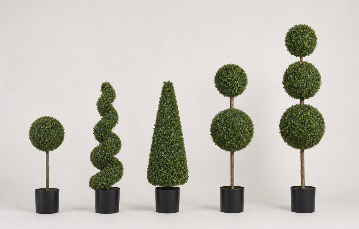 Artificial outdoor topiary lineup including sphere, spiral, cone, double ball and three ball forms